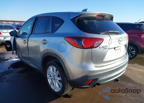 2013 Mazda Cx-5 Grand Touring z USA, uszkodzony, nr VIN JM3KE4DE8D0156887